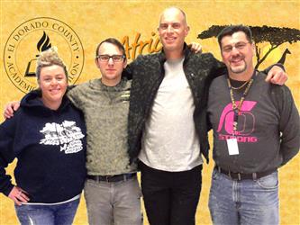 coaches posing with zoom background