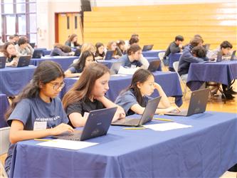 Students Conducting Essay 